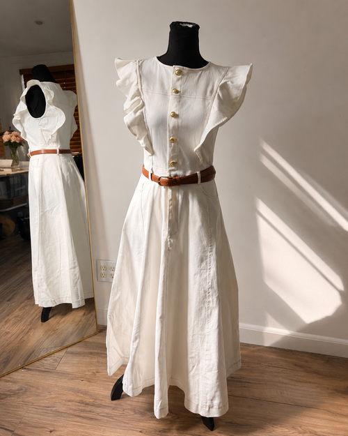 A solid woven midi dress